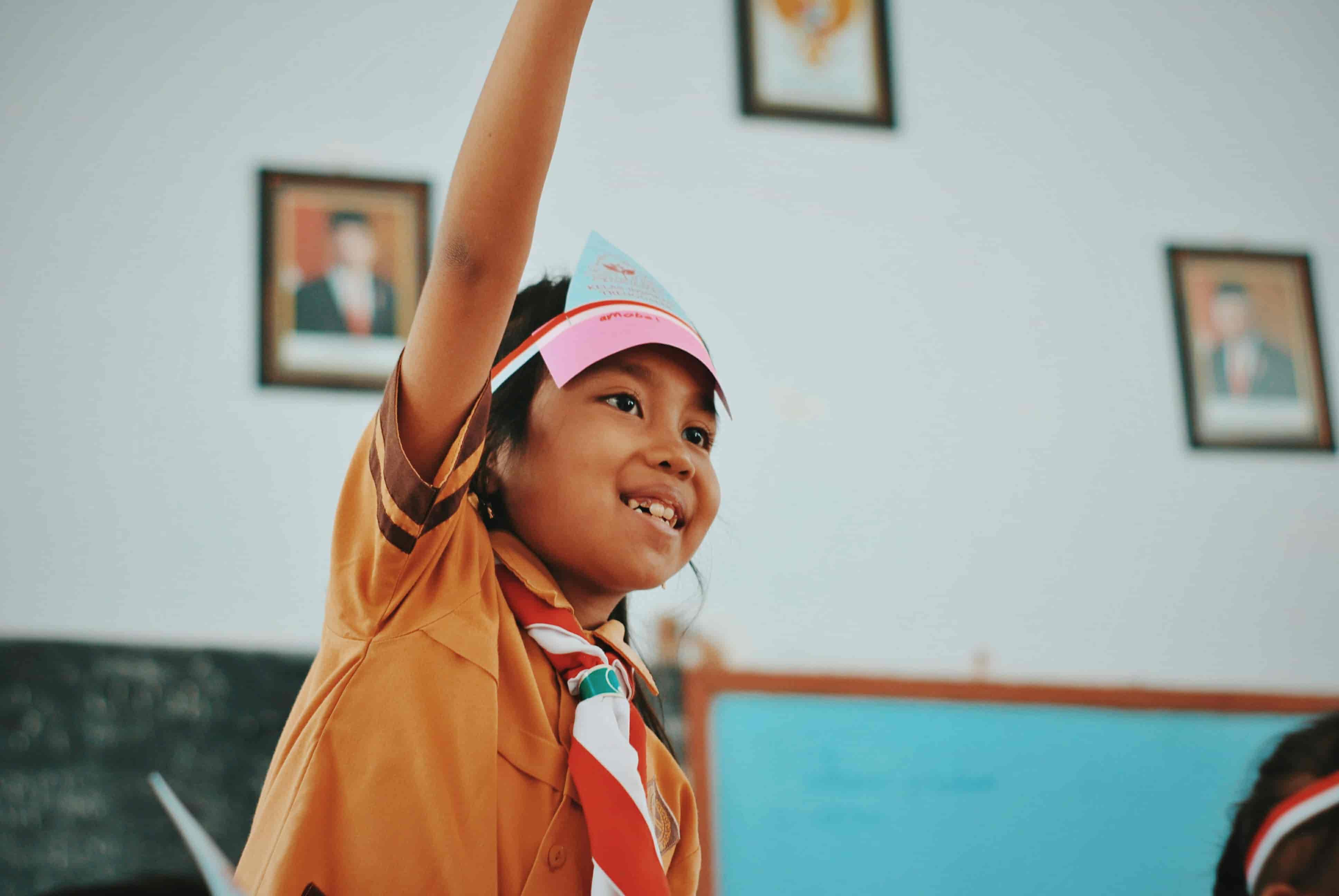 An Indonesian student in a scout uniform. Photo: © Unsplash
